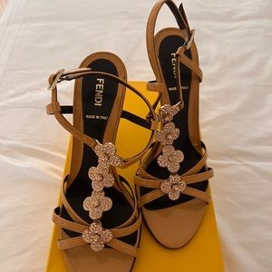 Fendi sandals with butterscotch crystal flowers.